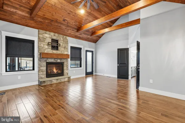 a kitchen with stainless steel appliances a refrigerator and a stove top oven