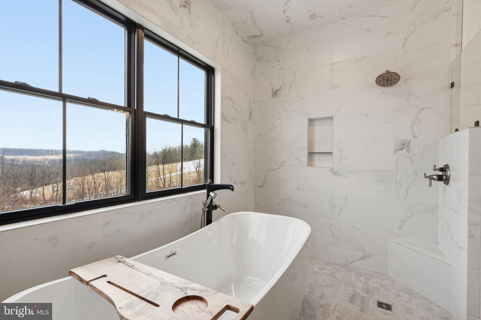 176 Fenstermaker Road Kutztown, PA 19530 - Photo 29 of 149 a bathroom with a tub and a shower