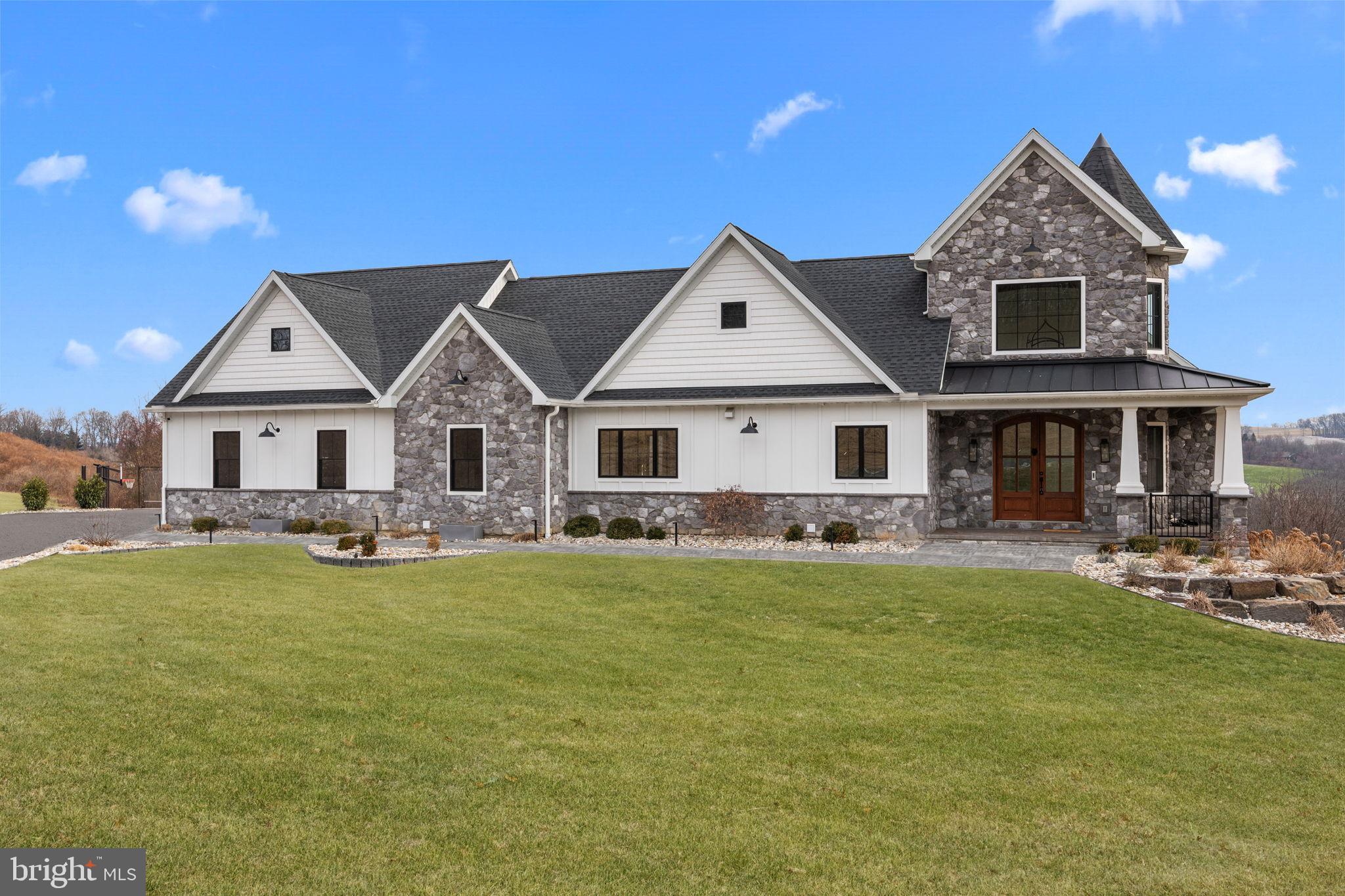 176 Fenstermaker Road Kutztown, PA 19530 - Photo 3 of 149 Charming stone-clad home with scenic views.