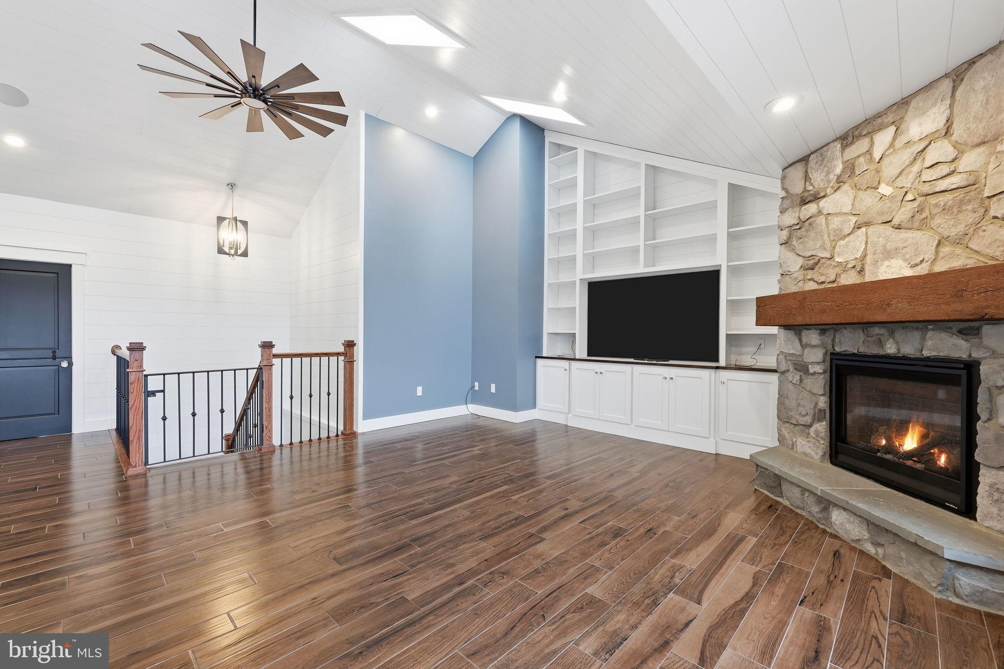 176 Fenstermaker Road Kutztown, PA 19530 - Photo 39 of 149 Spacious living area with elegant stone fireplace.