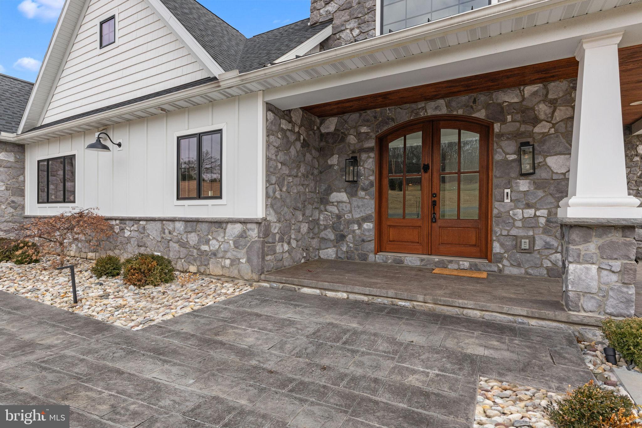 176 Fenstermaker Road Kutztown, PA 19530 - Photo 4 of 149 Charming stone entryway with elegant doors.