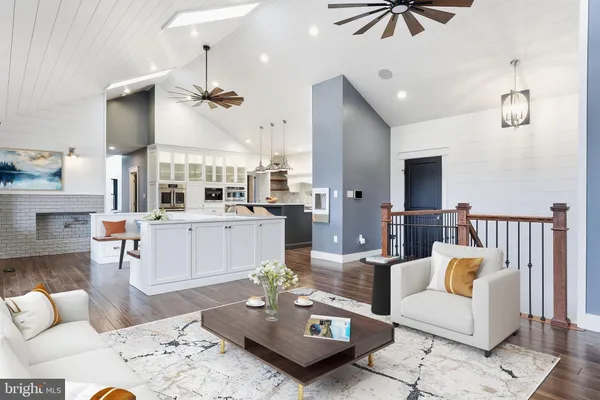 a bathroom with a bathtub and next to a window