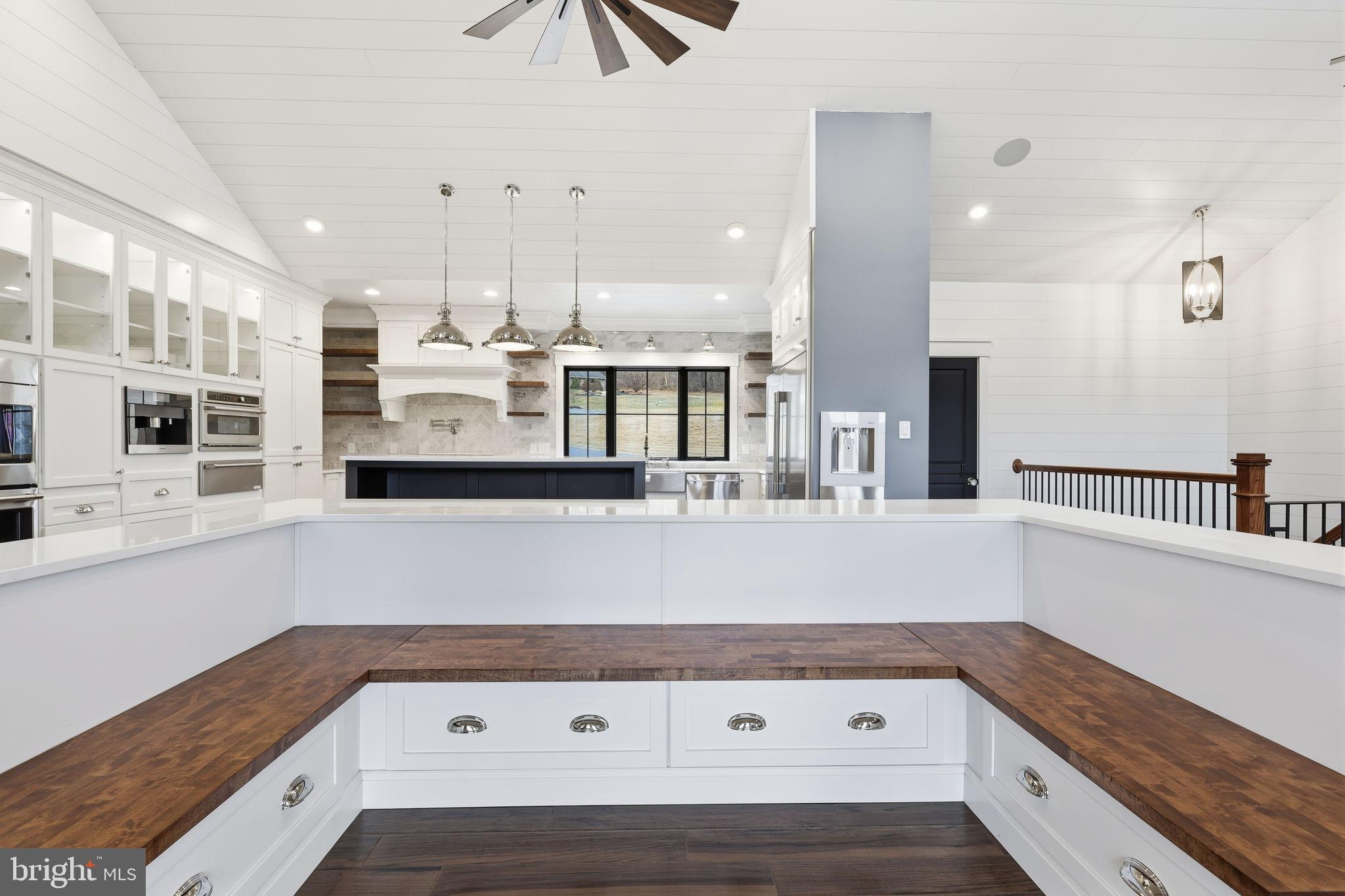 176 Fenstermaker Road Kutztown, PA 19530 - Photo 62 of 149 a kitchen with stainless steel appliances granite countertop a refrigerator and a stove