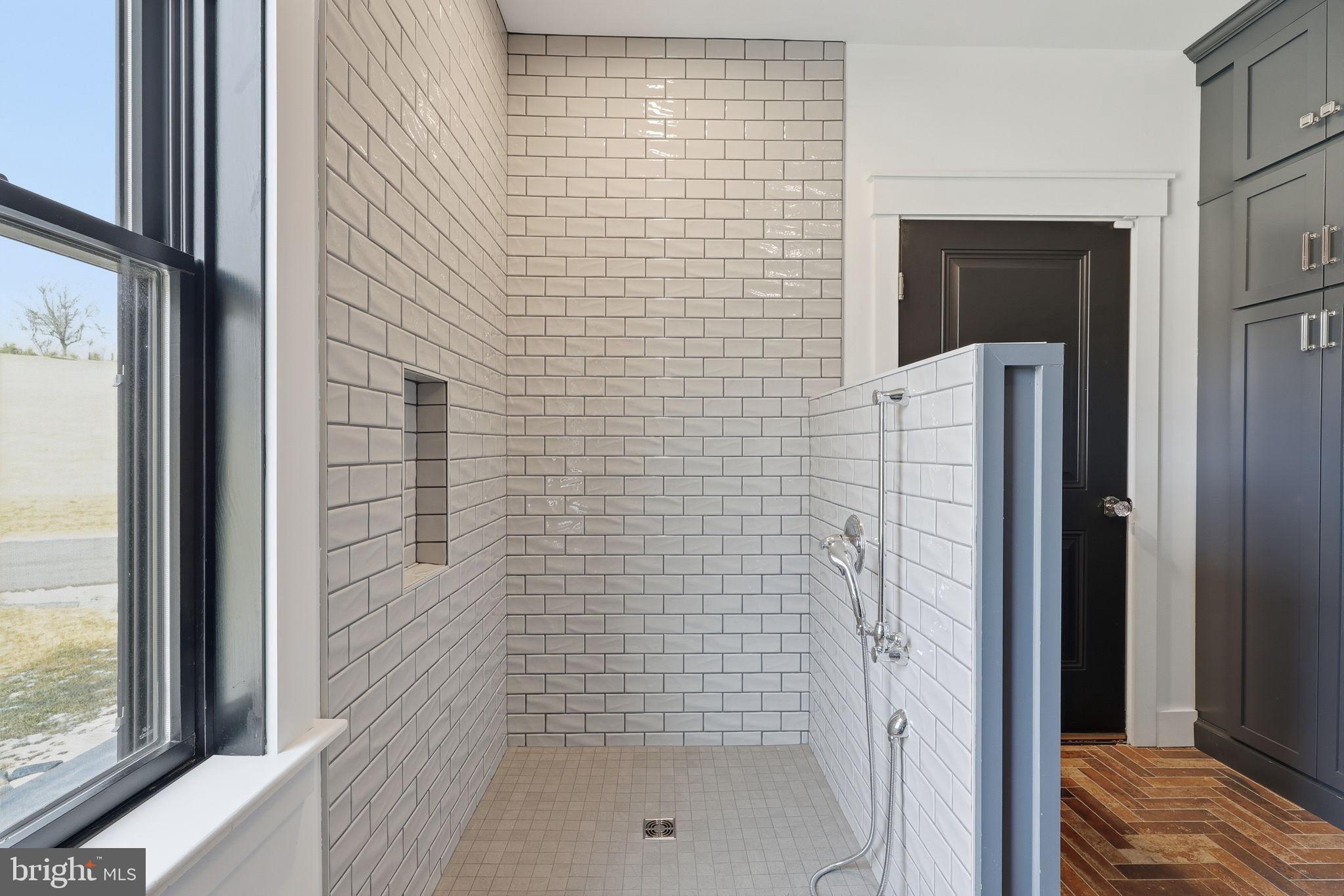 176 Fenstermaker Road Kutztown, PA 19530 - Photo 68 of 149 Sleek, modern shower with elegant tiles.