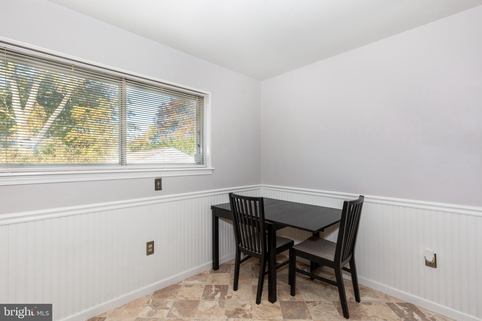 318 Bryanstone Road Reisterstown, MD 21136 - Photo 10 of 36 a view of a workspace with furniture and a window