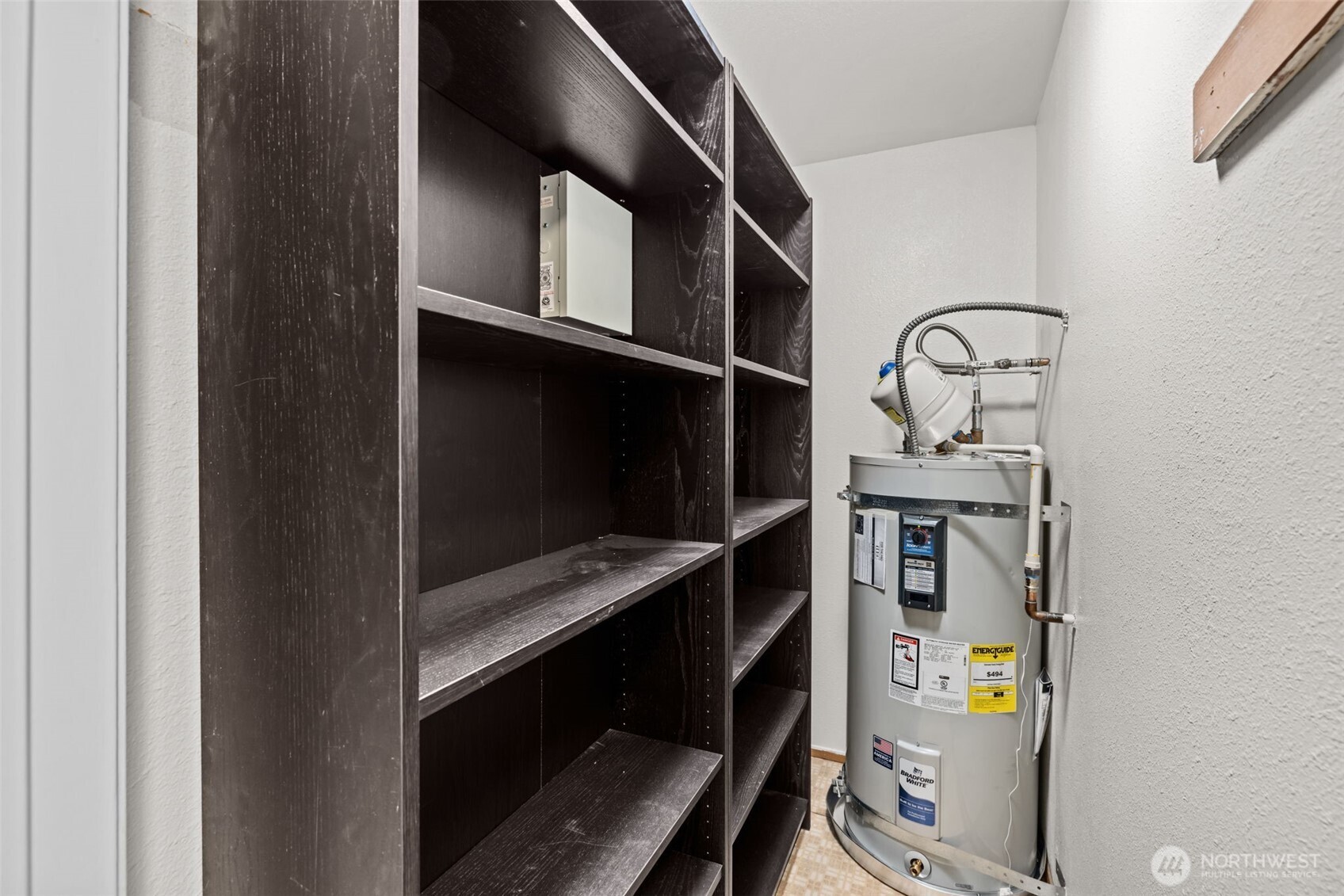 8512 242nd Street Southwest, Unit 3 Edmonds, WA 98026 - Photo 16 of 32 a close view of shoes and cabinets