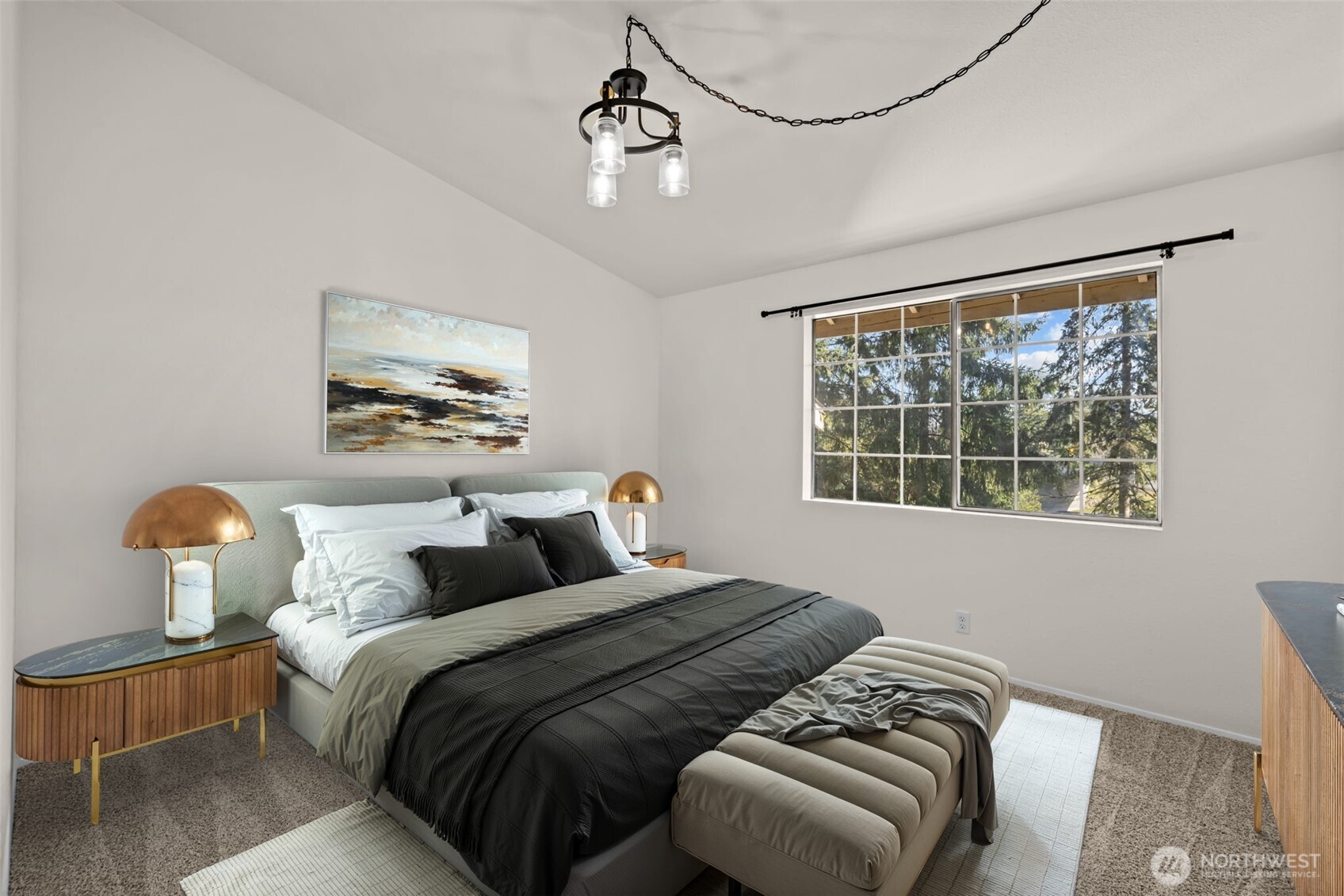 8512 242nd Street Southwest, Unit 3 Edmonds, WA 98026 - Photo 20 of 32 a bedroom with a bed a window and couch