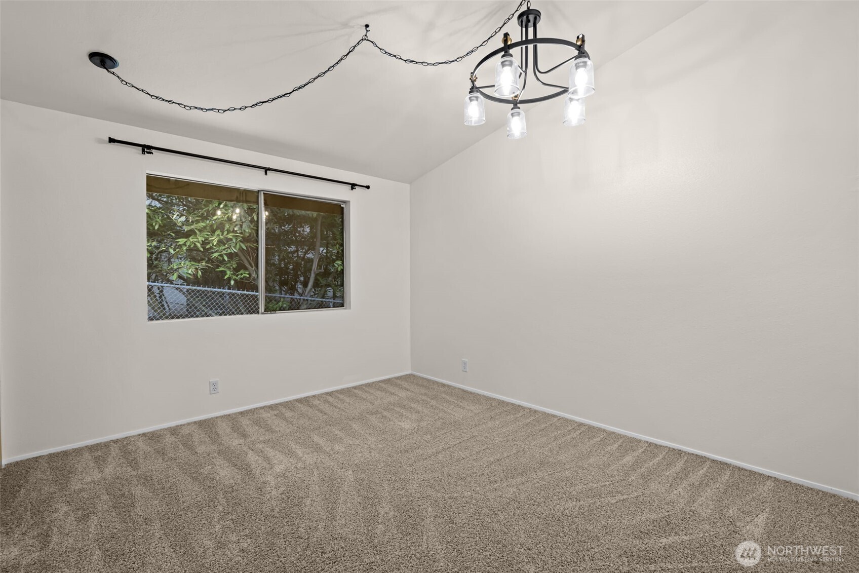 8512 242nd Street Southwest, Unit 3 Edmonds, WA 98026 - Photo 21 of 32 an empty room with a window