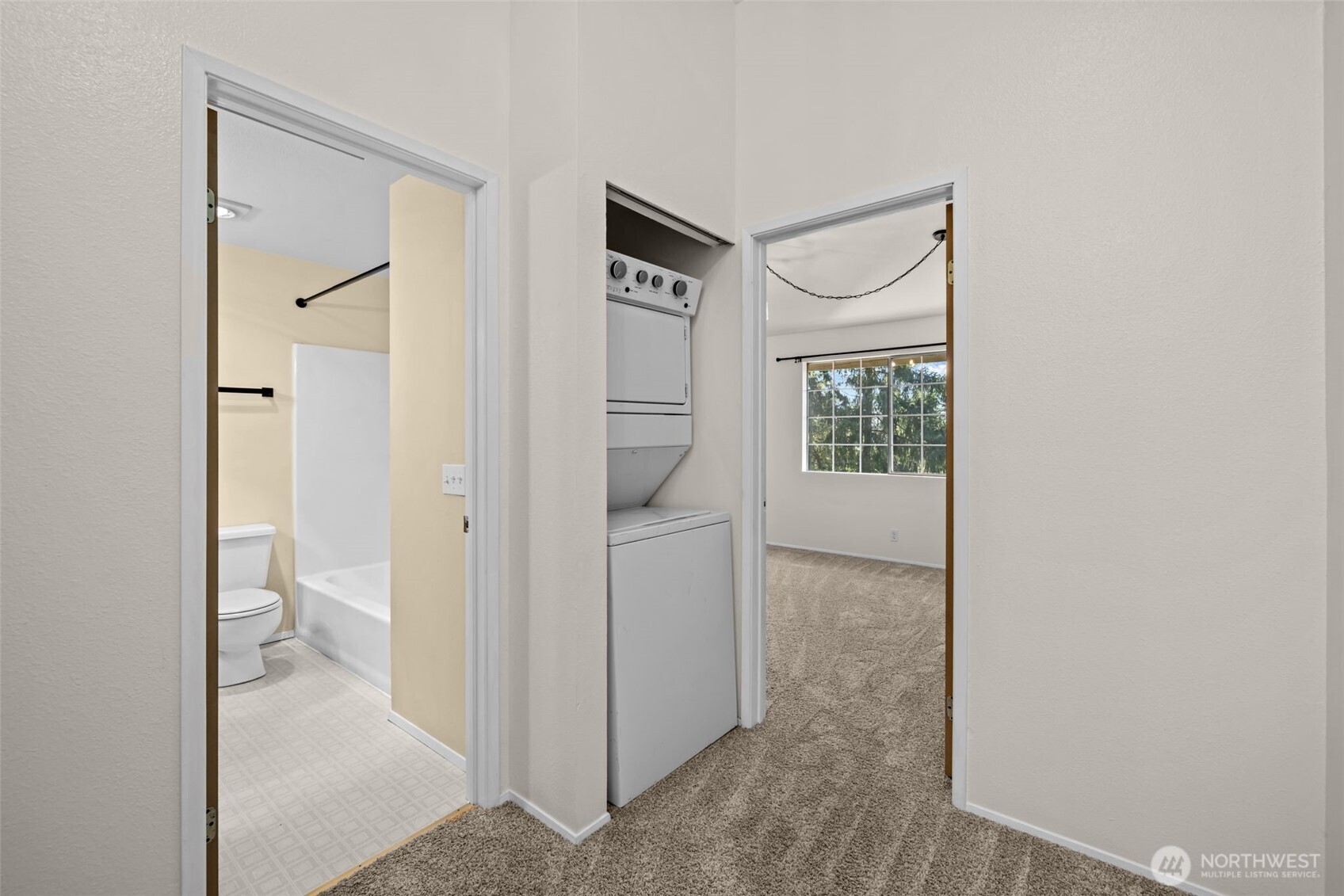 8512 242nd Street Southwest, Unit 3 Edmonds, WA 98026 - Photo 22 of 32 a view of an entryway with wooden floor