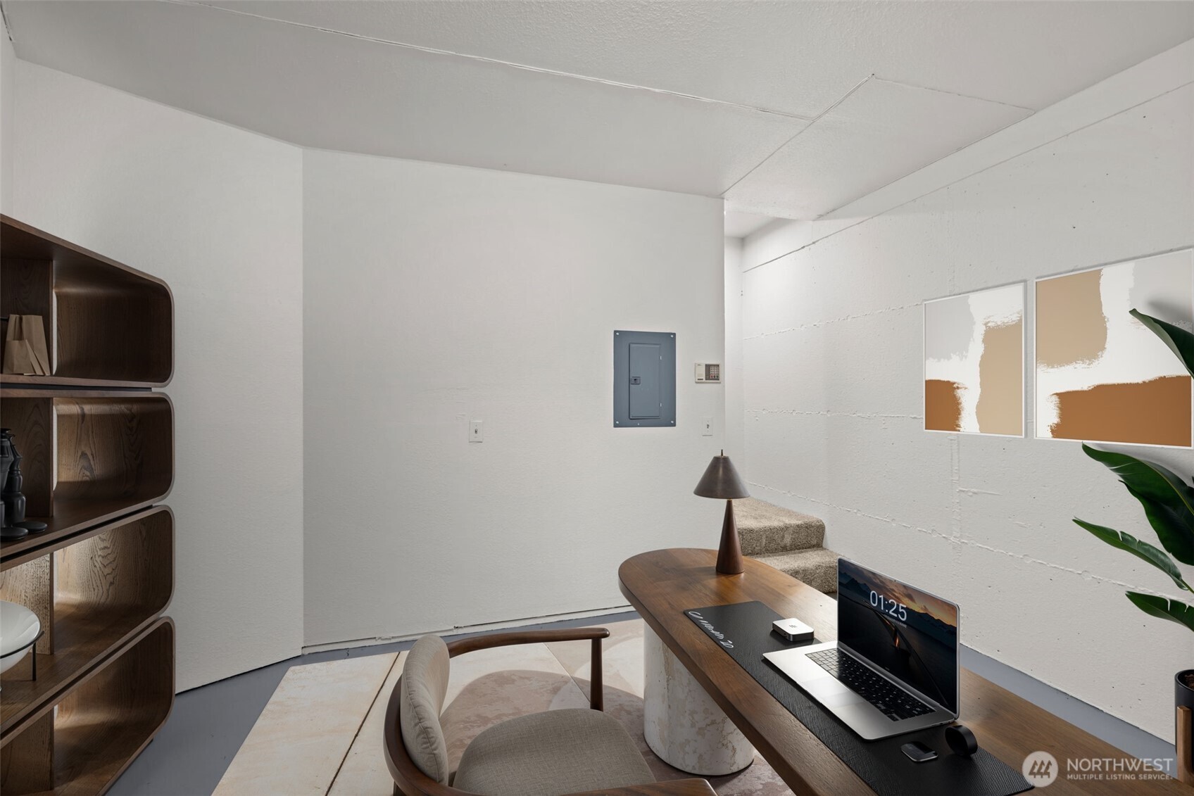 8512 242nd Street Southwest, Unit 3 Edmonds, WA 98026 - Photo 23 of 32 a living room with furniture and a flat screen tv