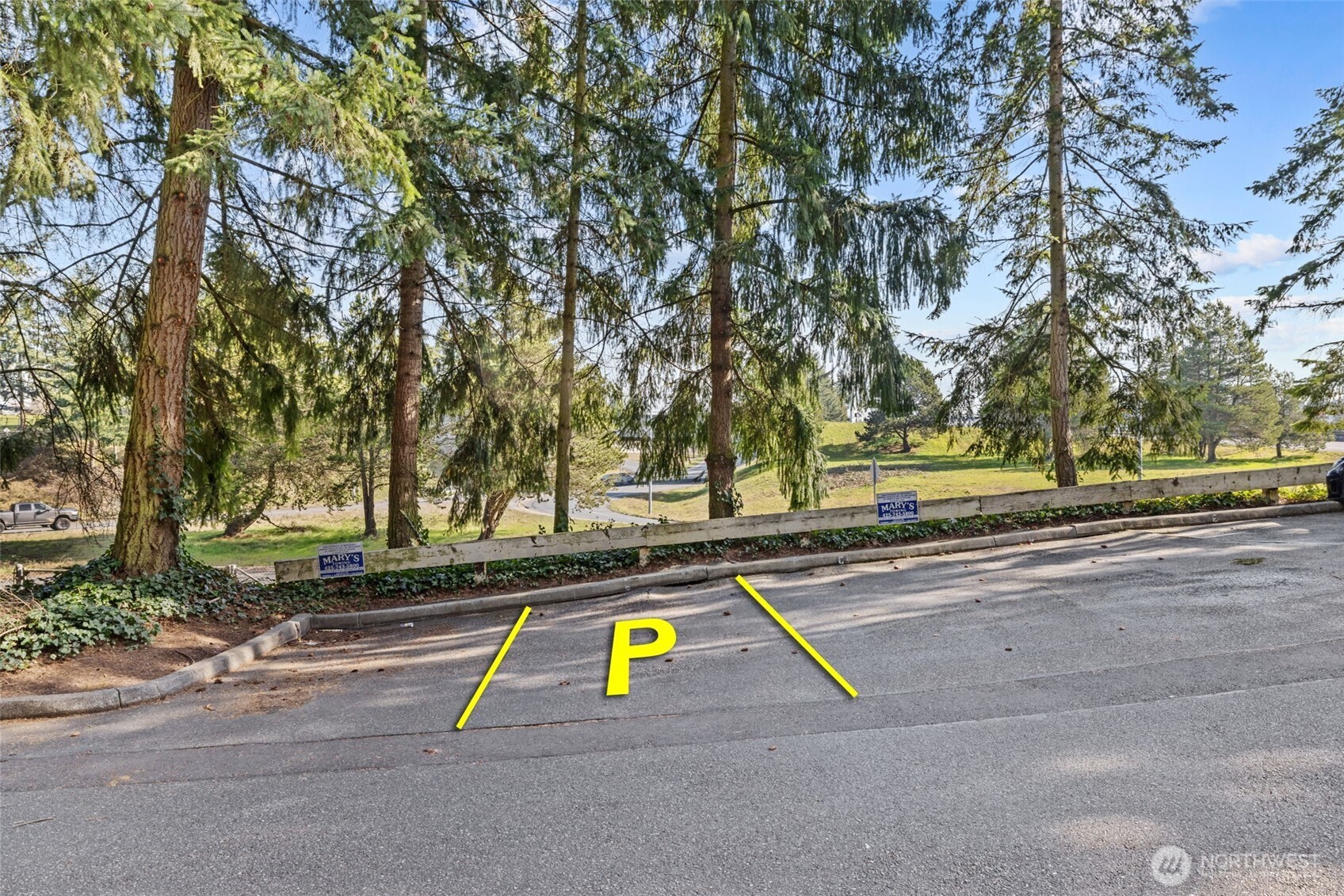 8512 242nd Street Southwest, Unit 3 Edmonds, WA 98026 - Photo 26 of 32 a view of swimming pool with a yard and seating area