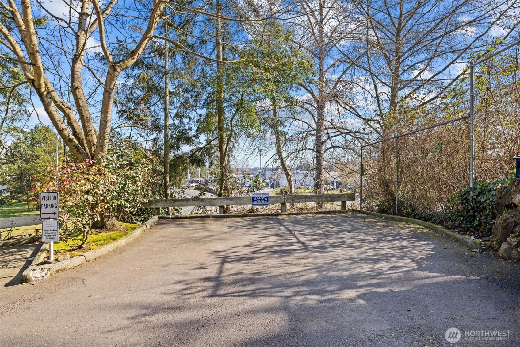 8512 242nd Street Southwest, Unit 3 Edmonds, WA 98026 - Photo 27 of 32 a view of a yard with trees