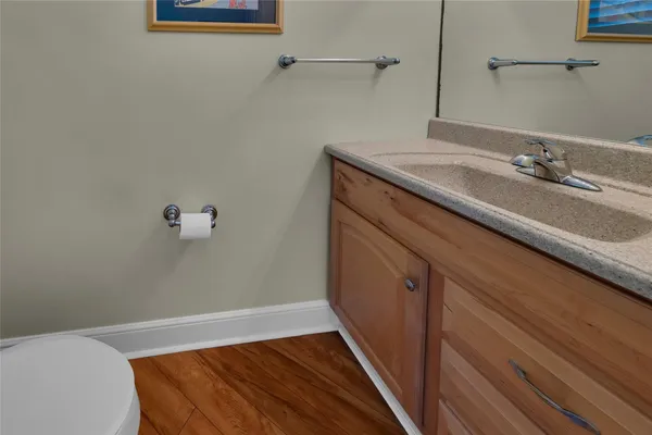 a bathroom with a sink and vanity