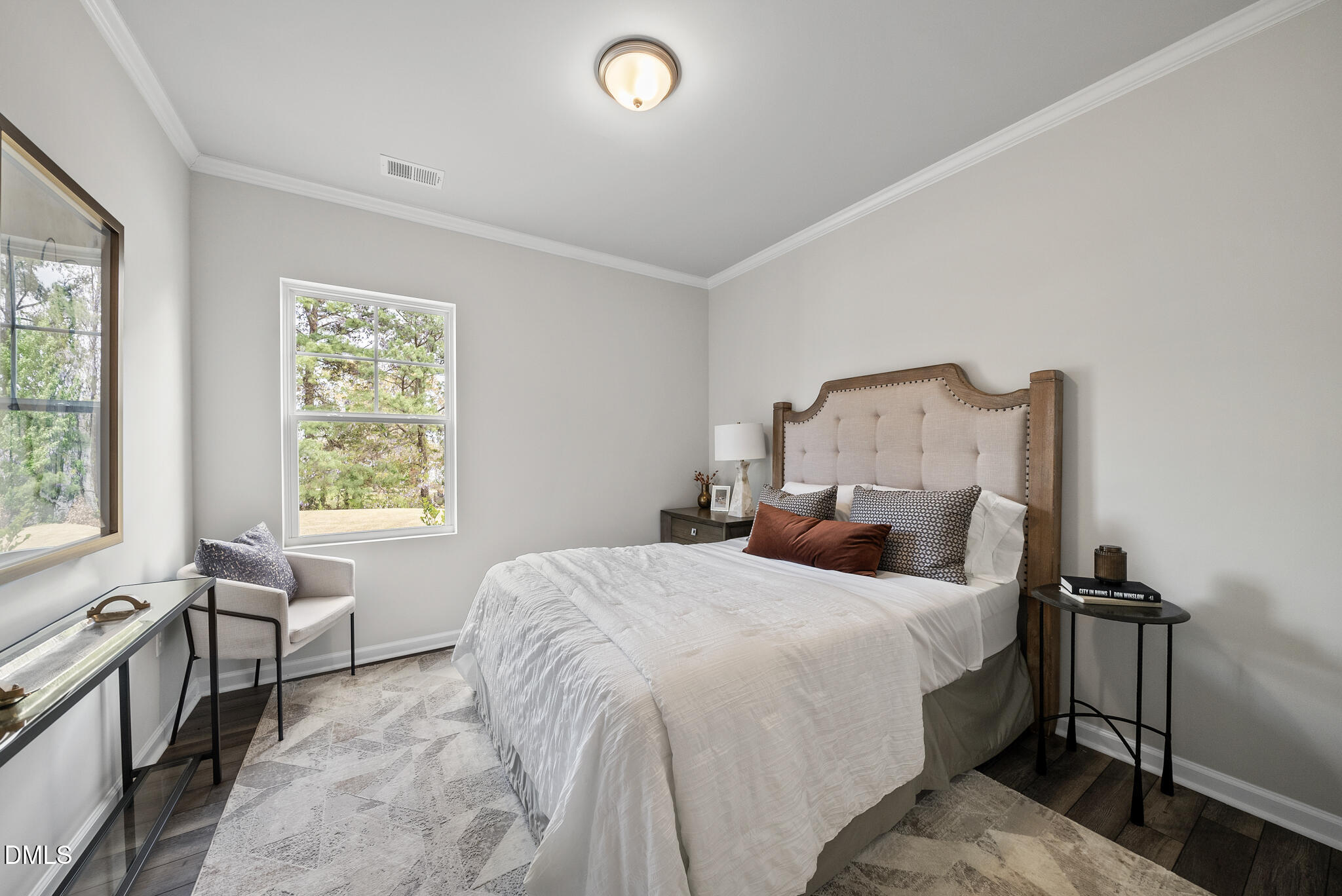 3836 Mason Blf Drive Raleigh, NC 27616 - Photo 20 of 37 a bedroom with a bed and a window