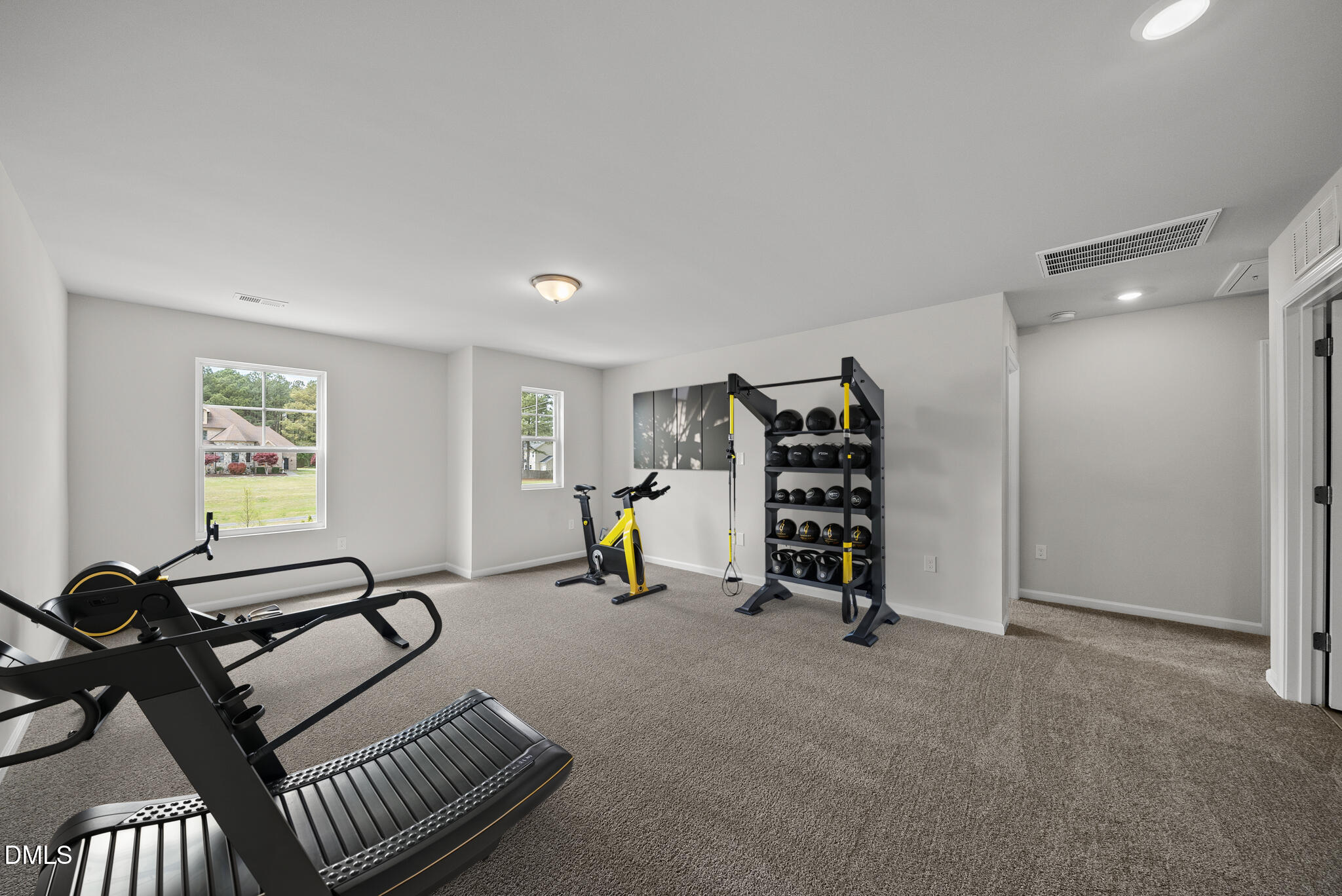 3836 Mason Blf Drive Raleigh, NC 27616 - Photo 28 of 37 a view of a room with gym equipment
