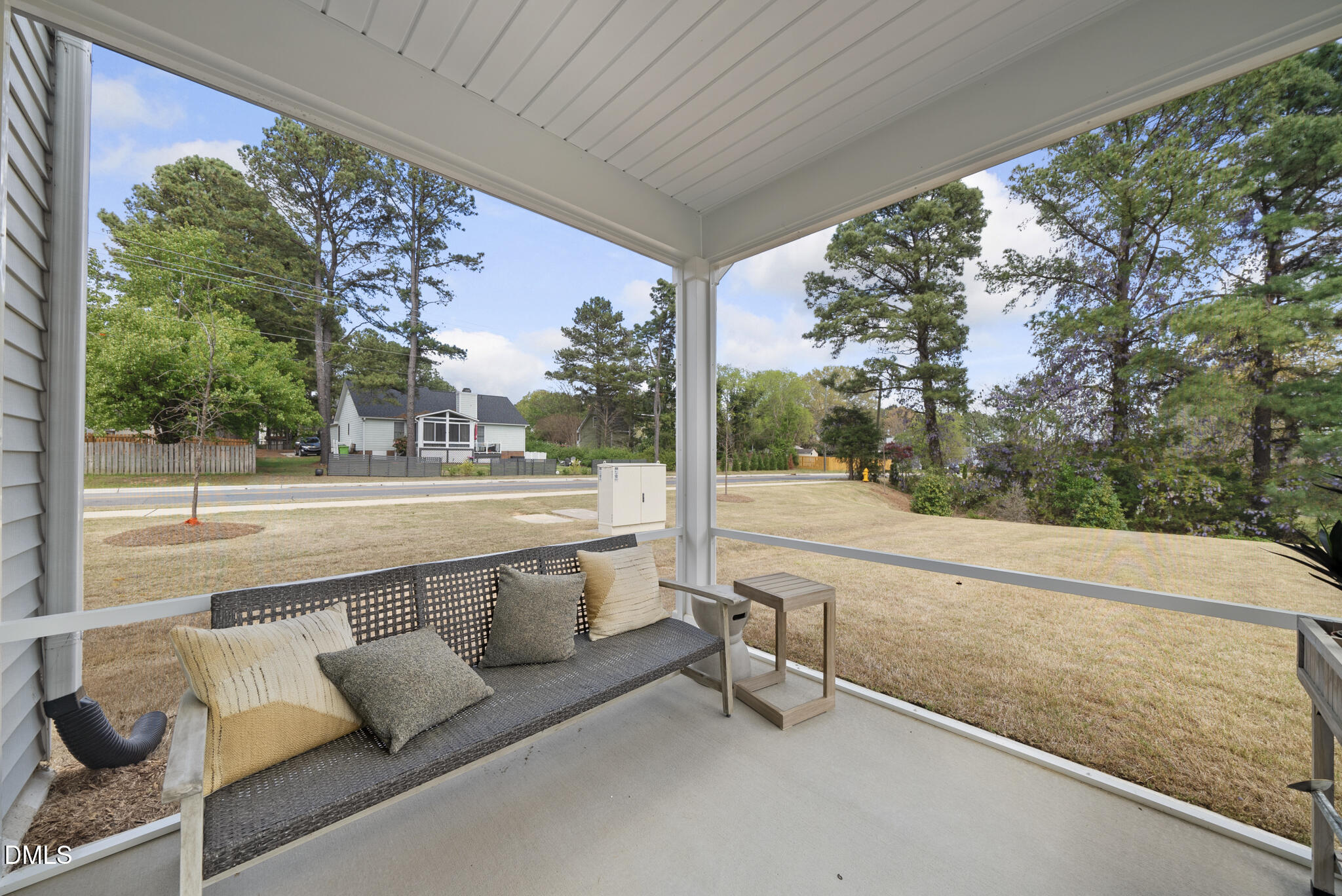 3836 Mason Blf Drive Raleigh, NC 27616 - Photo 3 of 37 a view of a porch with seating space