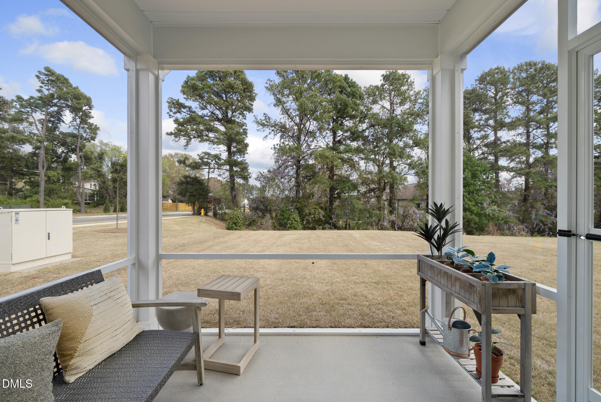 3836 Mason Blf Drive Raleigh, NC 27616 - Photo 4 of 37 a balcony with table and chairs