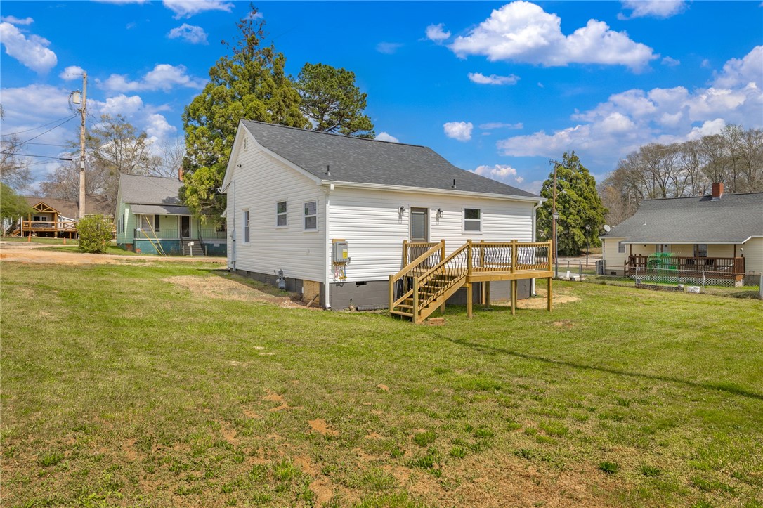 2 Allen Street Pelzer, SC 29669 - Photo 18 of 25 This charming home offers a spacious private yard and a lovely back deck for outdoor enjoyment.