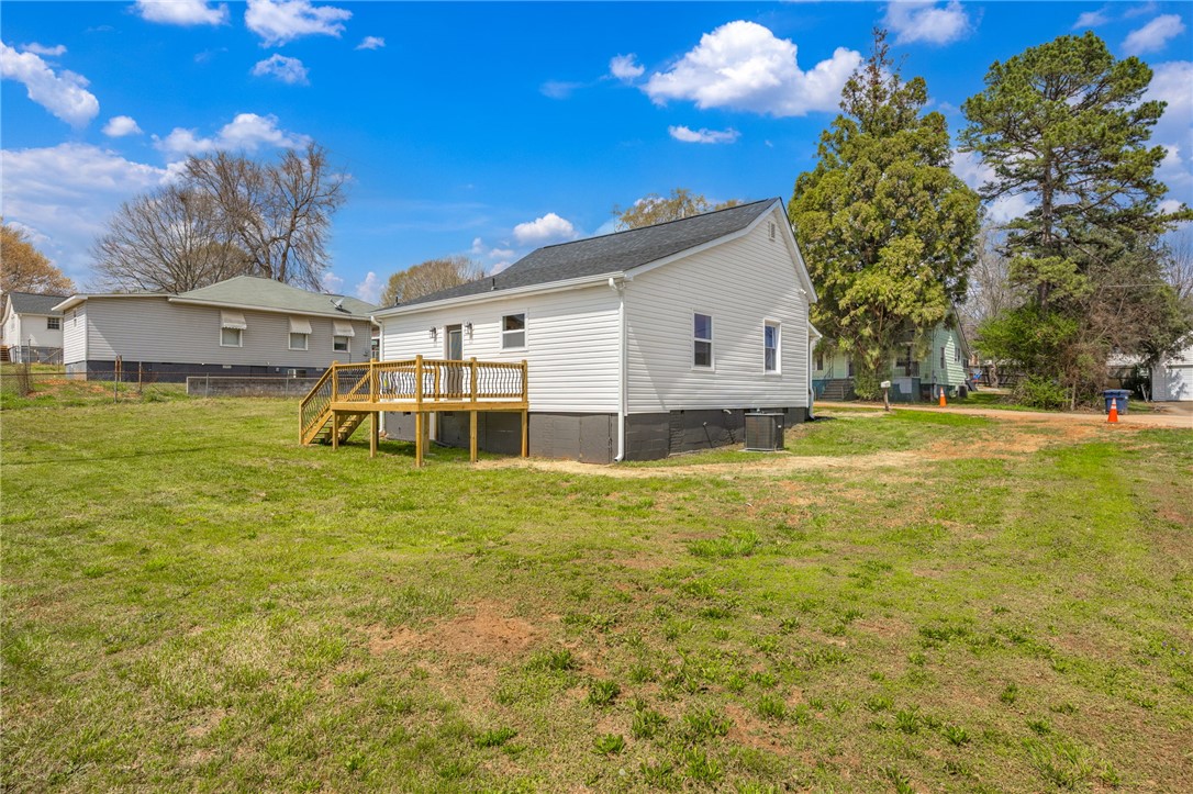2 Allen Street Pelzer, SC 29669 - Photo 19 of 25 This residence features a deck for outdoor enjoyment and a spacious yard.
