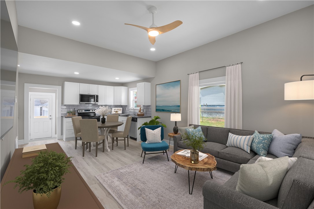 2 Allen Street Pelzer, SC 29669 - Photo 7 of 25 An inviting open-concept space perfect for daily living and entertaining.