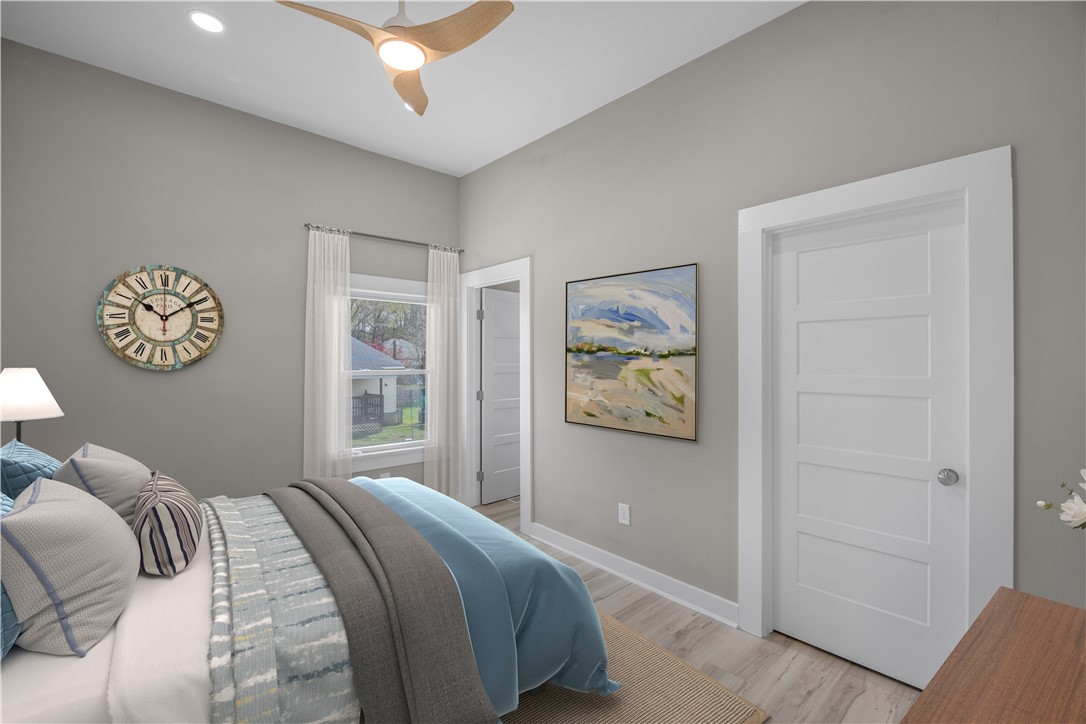 2 Allen Street Pelzer, SC 29669 - Photo 10 of 25 This tranquil bedroom offers comfort and a peaceful escape.