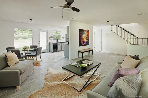 a living room with furniture and a window