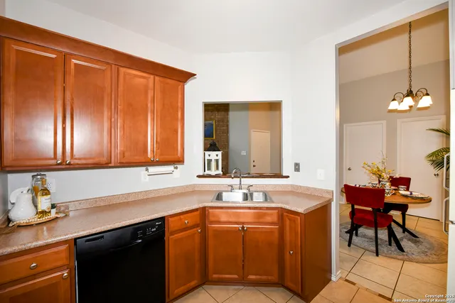 a kitchen with a sink and a cabinets