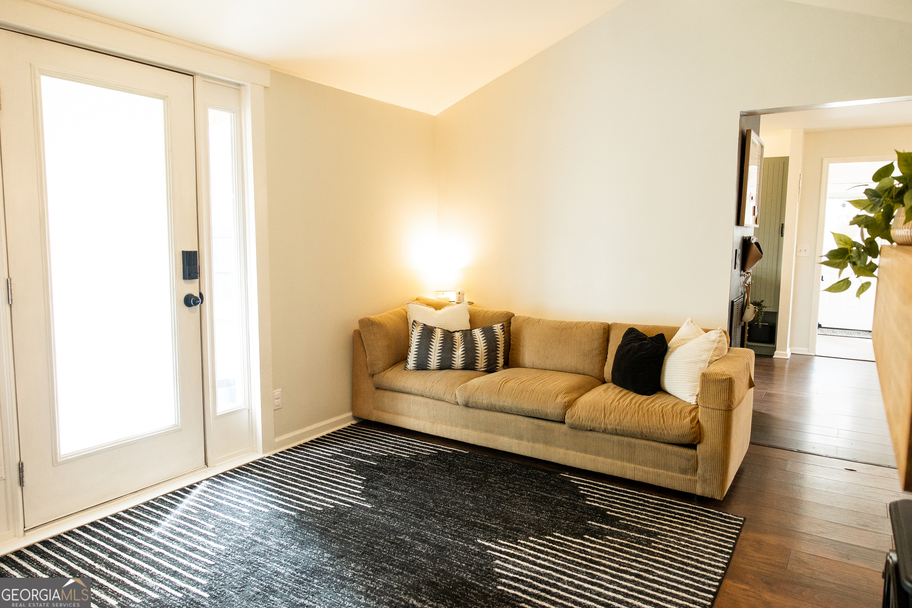 5720 N Highway Springfield, GA 31329 - Photo 11 of 27 a living room with furniture and a window