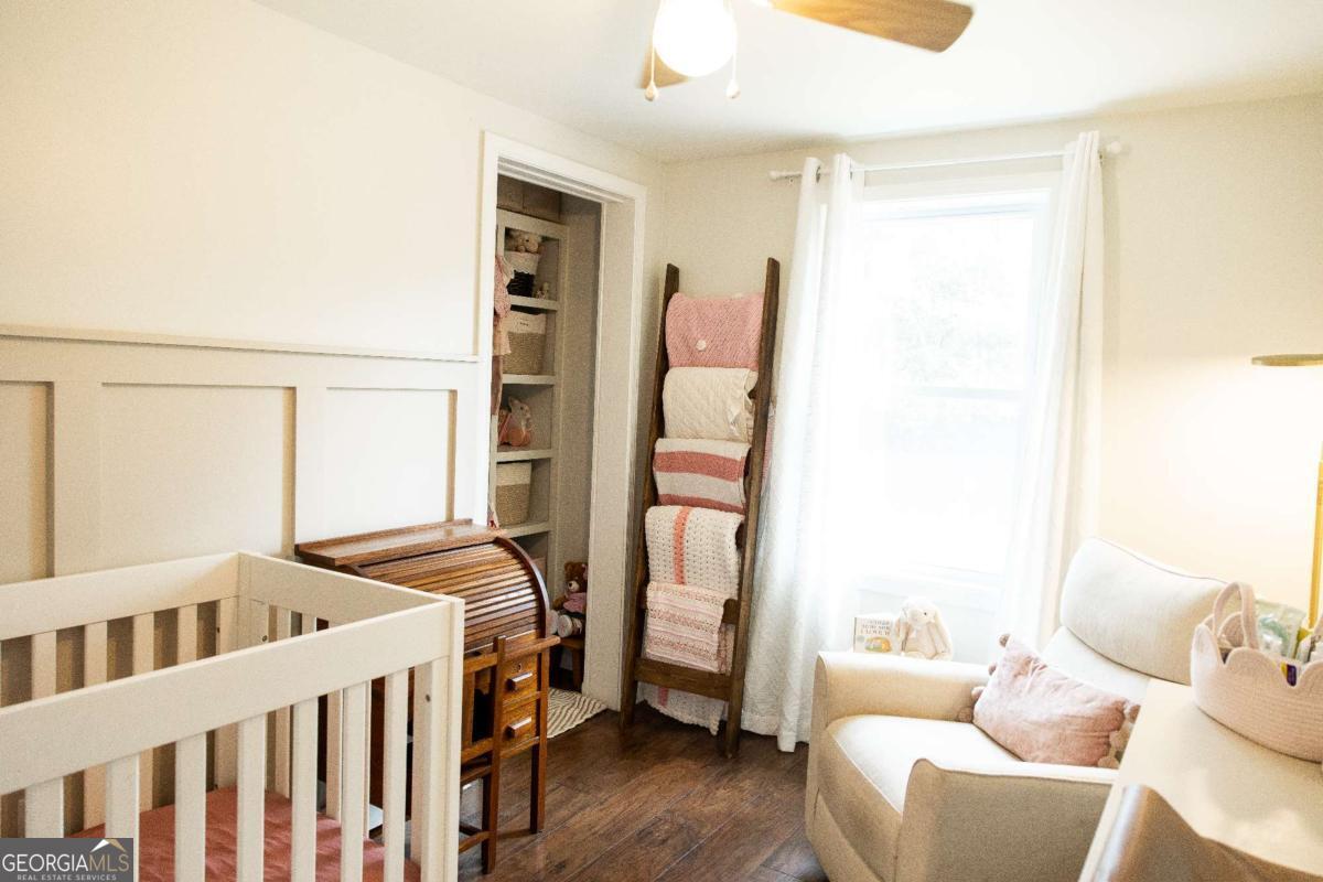 5720 N Highway Springfield, GA 31329 - Photo 16 of 27 a bedroom with furniture and a window