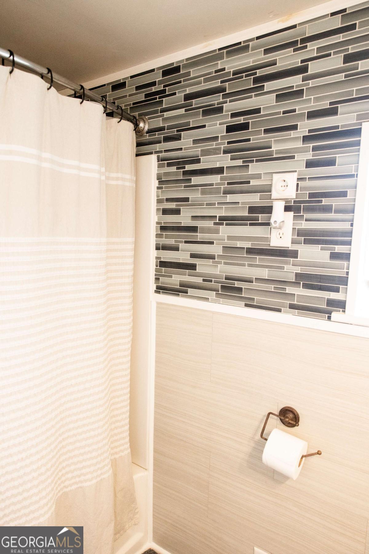 5720 N Highway Springfield, GA 31329 - Photo 18 of 27 a bathroom with a shower and a sink