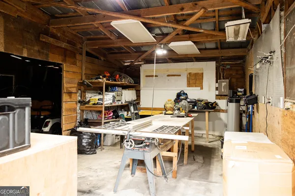 a view of a kitchen with furniture and a kitchen