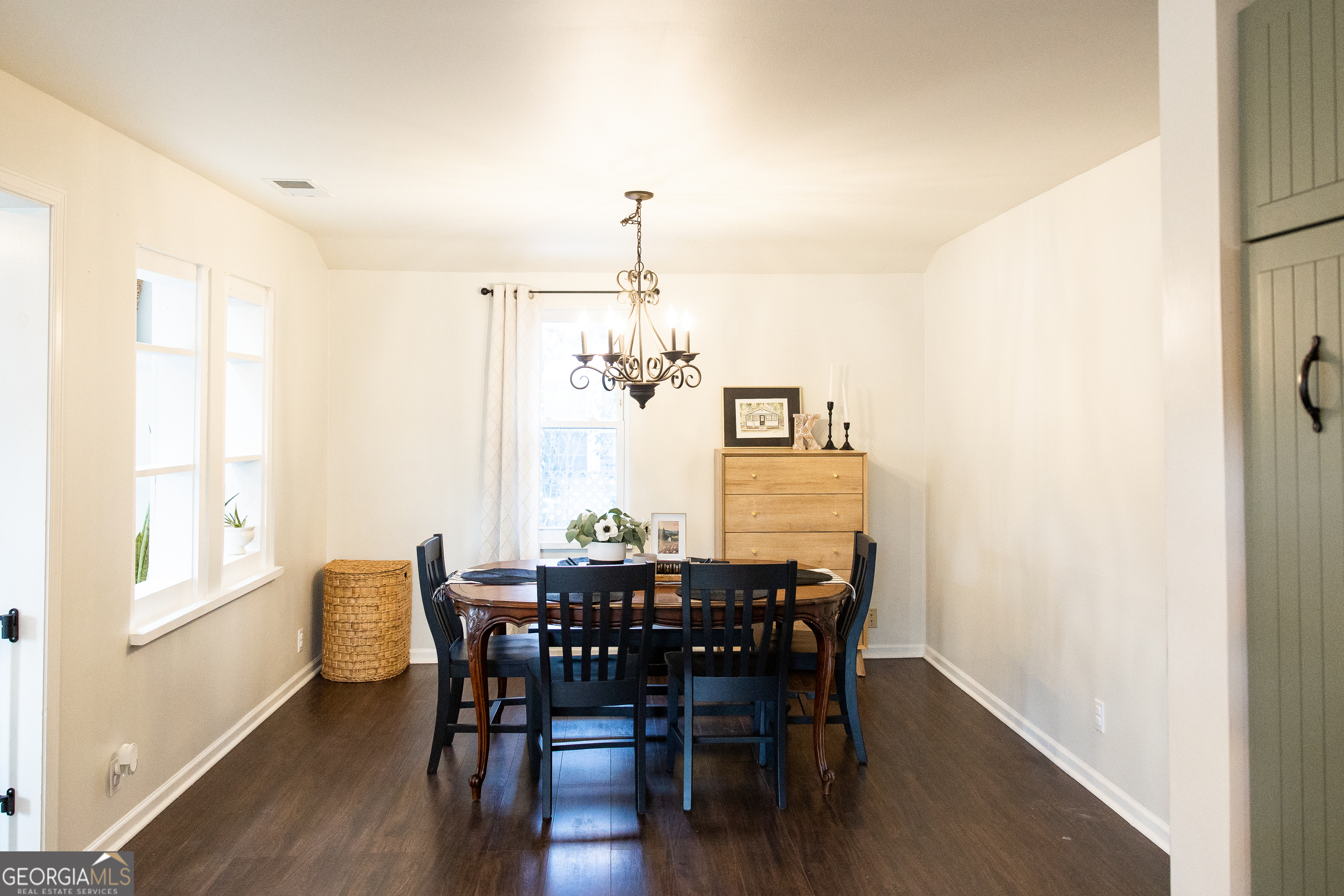5720 N Highway Springfield, GA 31329 - Photo 9 of 27 a view of a dining room with furniture and window