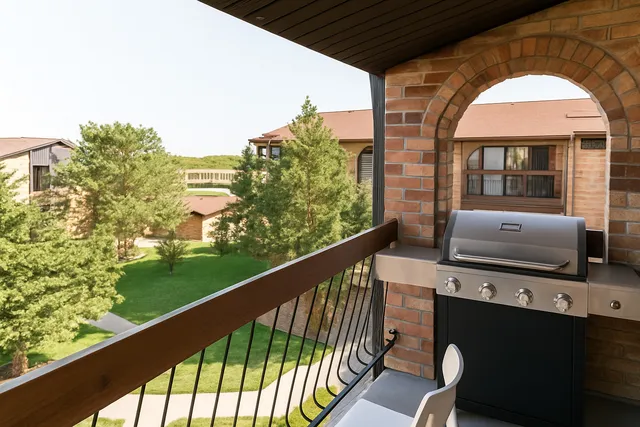 a view of balcony with furniture