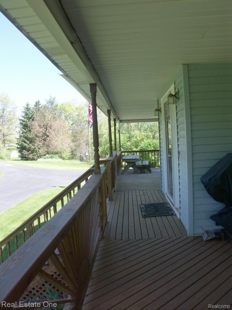 1470 Ranch Road Holly, MI 48442 - Photo 14 of 63 Beautiful wrap around porch