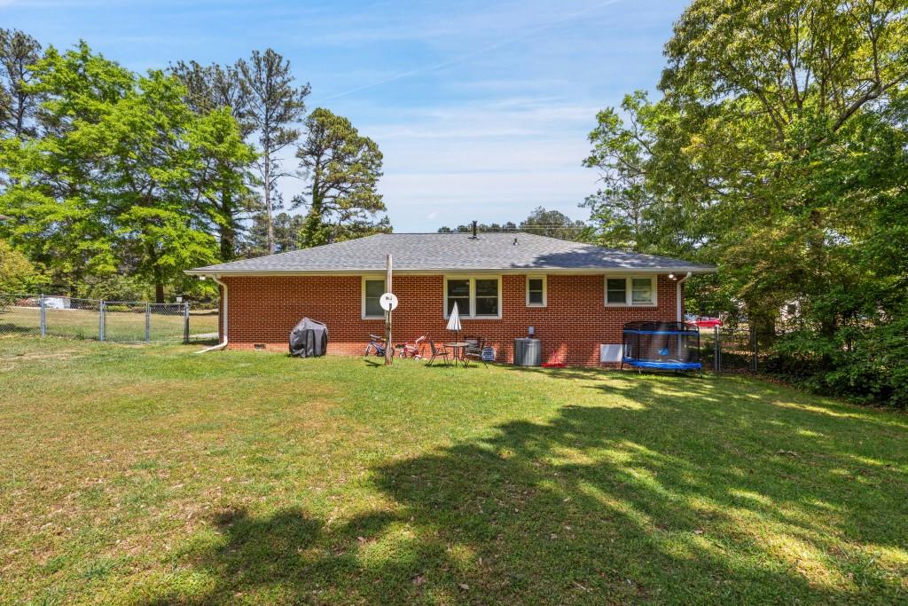 374 Dacula Road Dacula, GA 30019 - Photo 19 of 20 a view of a house with a yard