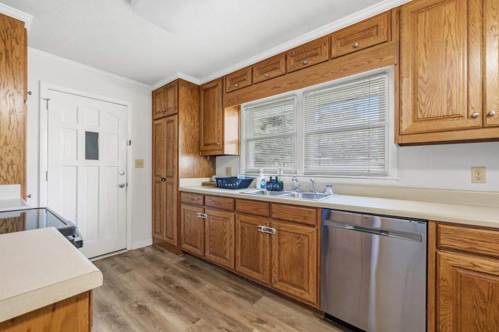 374 Dacula Road Dacula, GA 30019 - Photo 10 of 20 a kitchen with white cabinets and sink