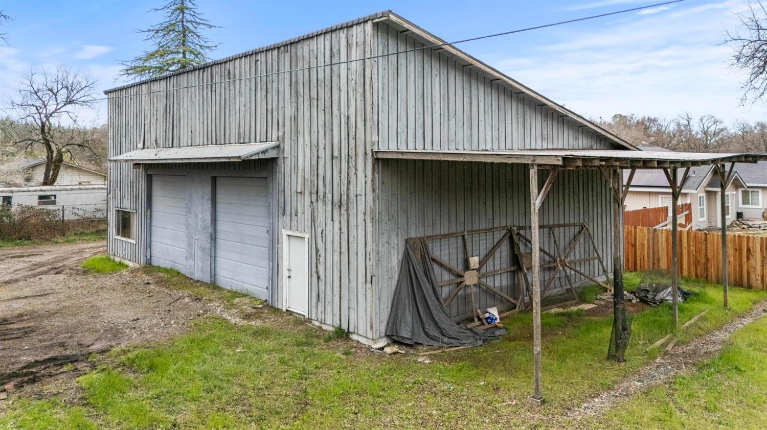 a house view with a backyard space