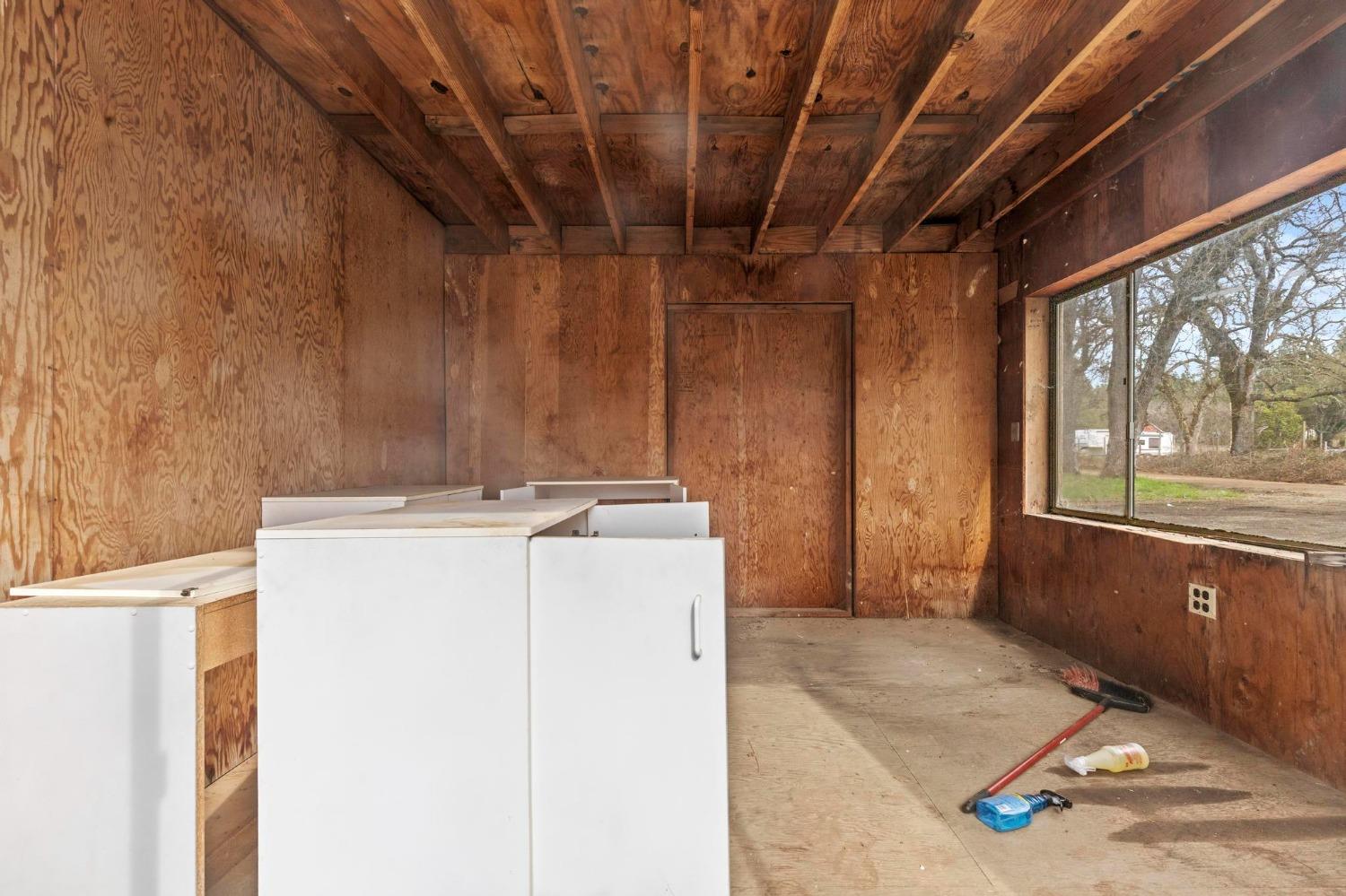 13312 Rices Crossing Road Oregon House, CA 95962 - Photo 11 of 17 a view of a storage & utility room with washer and dryer