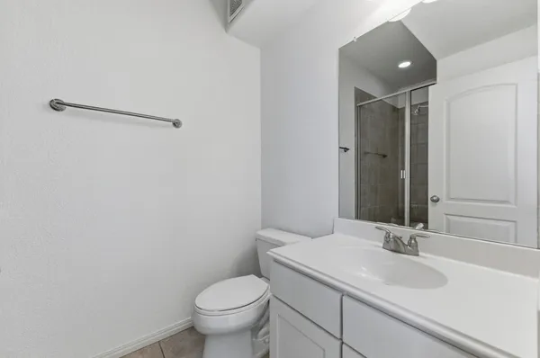 a bathroom with a sink and a toilet