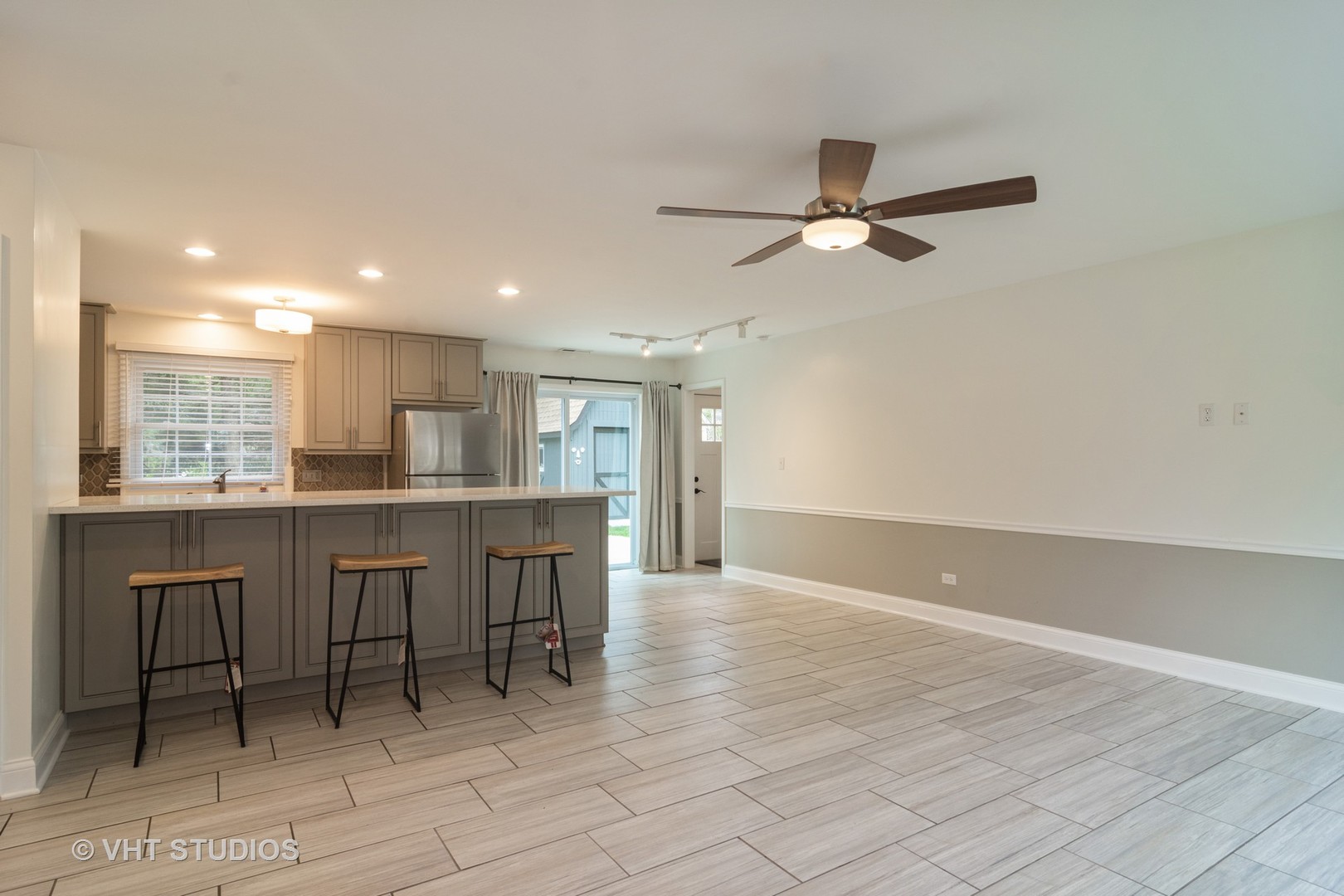 422 Glen Garry Road Cary, IL 60013 - Photo 2 of 12 a view of kitchen with granite countertop cabinets and window