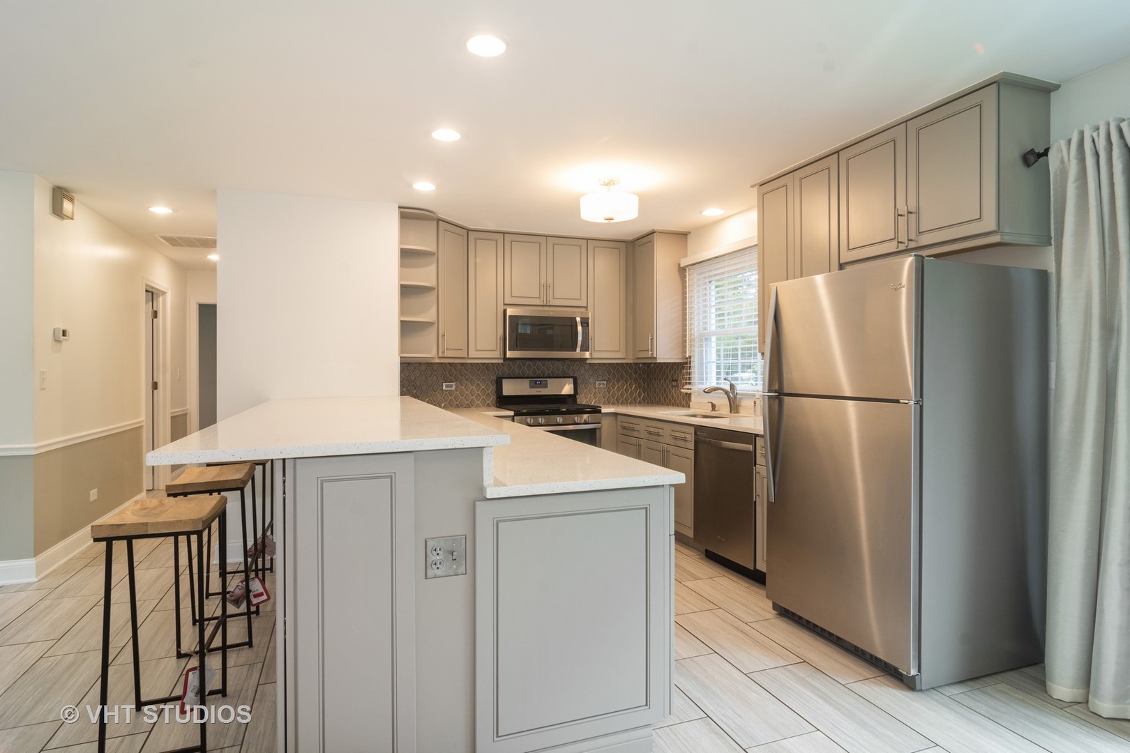 422 Glen Garry Road Cary, IL 60013 - Photo 5 of 12 a kitchen with stainless steel appliances granite countertop a refrigerator a stove a sink and a refrigerator