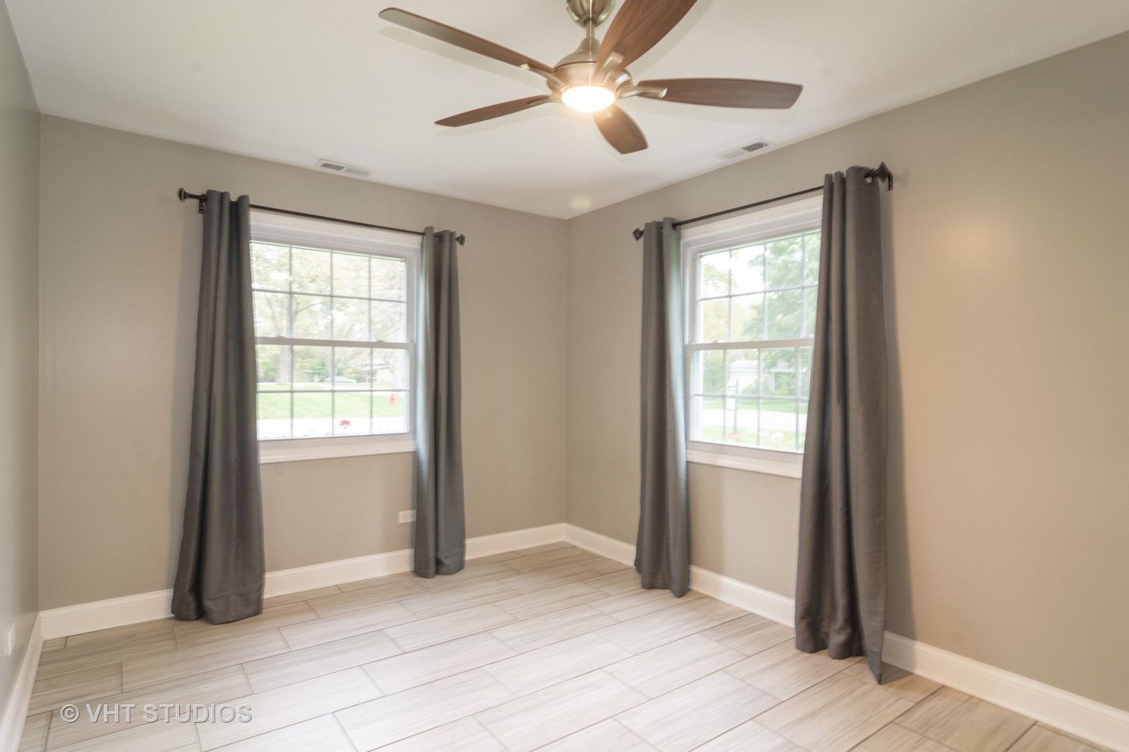 422 Glen Garry Road Cary, IL 60013 - Photo 8 of 12 a view of an empty room with a window