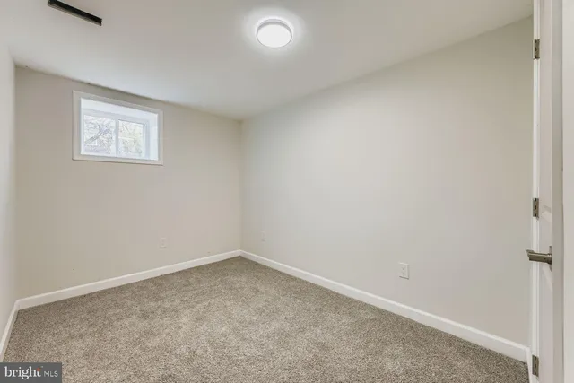 an empty room with a workbench