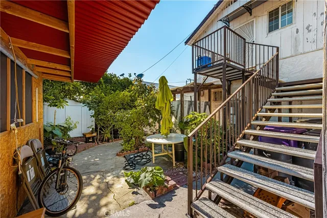 a view of entryway with wooden stairs
