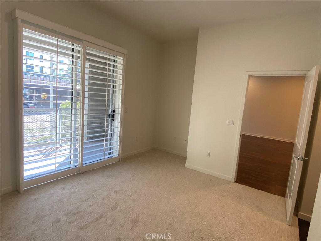 21 Gramercy, Unit 116 Irvine, CA 92612 - Photo 5 of 9 a view of empty room with windows