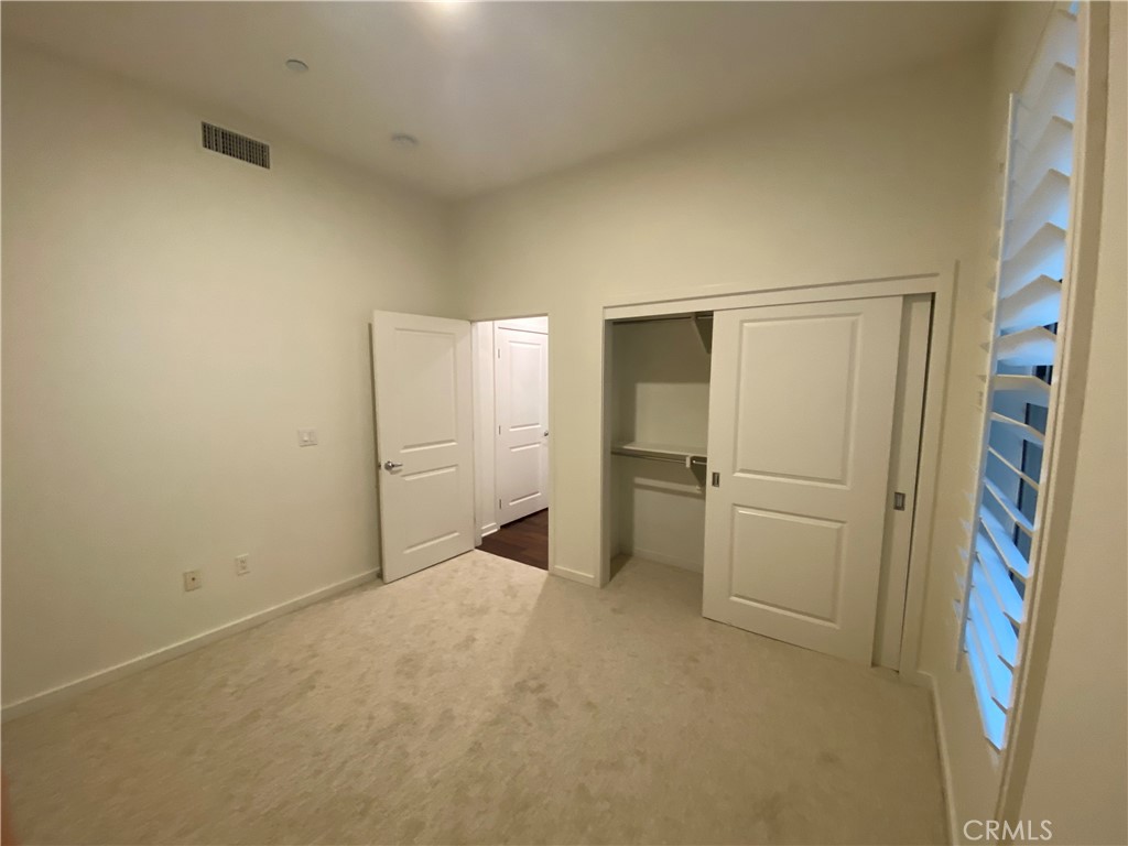 21 Gramercy, Unit 116 Irvine, CA 92612 - Photo 7 of 9 a view of an empty room