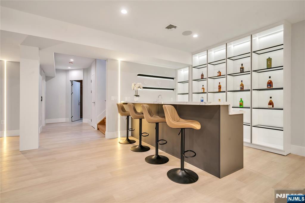 11 Roberts Road Englewood Cliffs, NJ 07632 - Photo 40 of 50 a view of kitchen center island and stainless steel appliances
