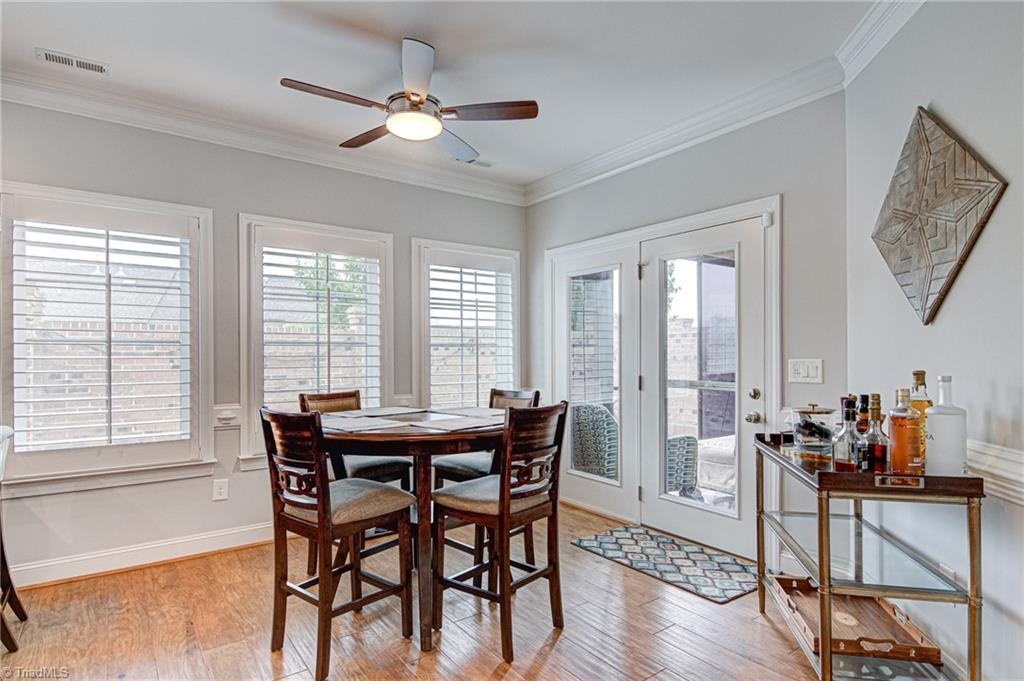 634 Nikyle Circle High Point, NC 27265 - Photo 13 of 32 The large dining area is bright and open for entertaining family and friends. Art work over the bar cart will not convey. The furniture of the home and most accessories are available for purchase. Home can be sold furnished.
