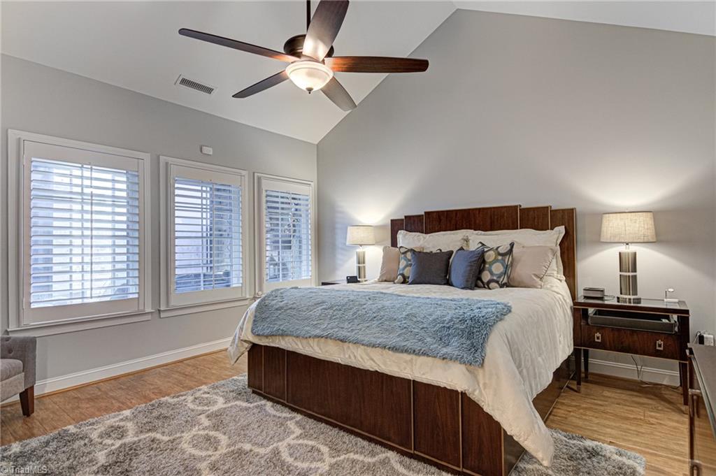 634 Nikyle Circle High Point, NC 27265 - Photo 14 of 32 The Primary bedroom with vaulted ceiling and upgraded ceiling fan. Nicely sized to meet all your furniture needs.
