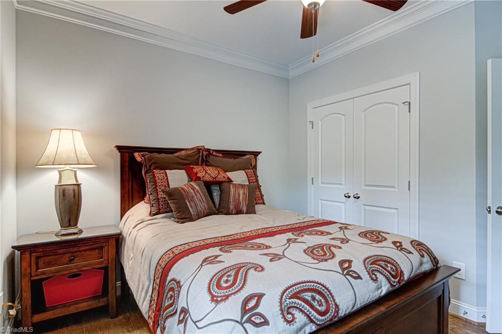 634 Nikyle Circle High Point, NC 27265 - Photo 23 of 32 Bedroom 2 also has nice closet space. Crown molding in this room is another nice upgrade in this home. Remember the home can be purchased furnished.